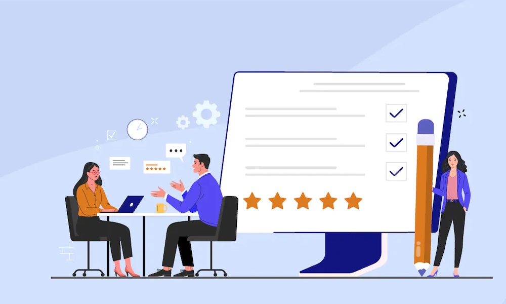 Two people discuss in front of a computer displaying a checklist and star ratings.